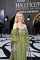 elle fanning accessorizes green gown with blood drops at maleficent 2 world premiere 05