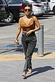 kourtney kardashian pairs plunging top with acid wash jeans lunch la 01