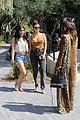 kourtney kardashian pairs plunging top with acid wash jeans lunch la 03