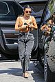 kourtney kardashian pairs plunging top with acid wash jeans lunch la 04