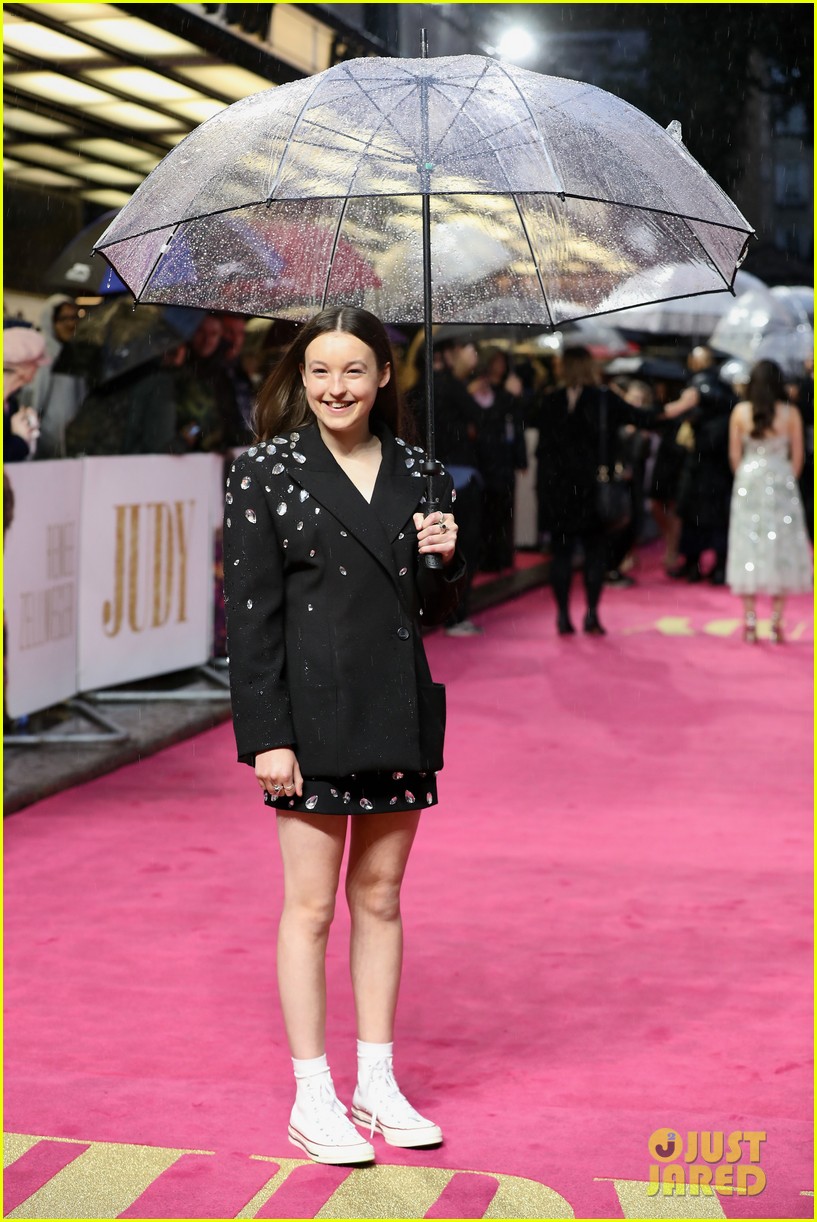 renee zellweger keeps dry with umbrella at judy european premiere 294362790