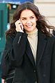 katie holmes shares a laugh while talking on the phone 02