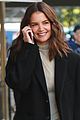 katie holmes shares a laugh while talking on the phone 04