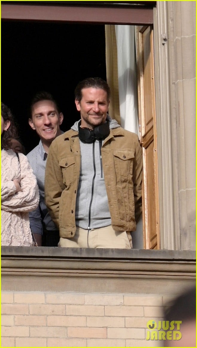 Bradley Cooper Watches the Macy's Thanksgiving Day Parade From a Window