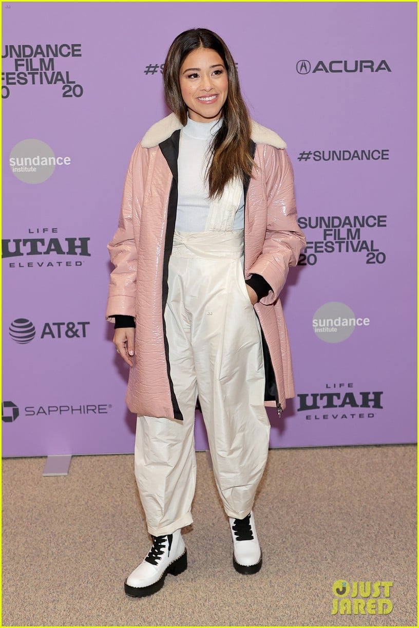 Gina Rodriguez Flexes Her Muscles at 'Kajillionaire' Premiere with Evan