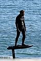 brody jenner surfs on top of water 04