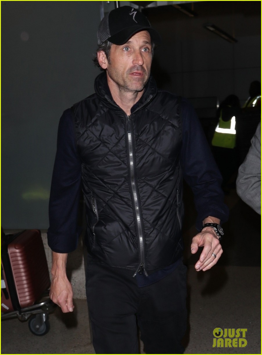 patrick dempsey wife jillian touch down at lax together 014439811
