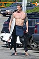 joel kinnaman shirtless surfing at beach 06