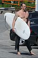 joel kinnaman shirtless surfing at beach 21
