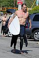 joel kinnaman shirtless surfing at beach 29