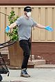 casey affleck goes grocery shopping in mask gloves 01