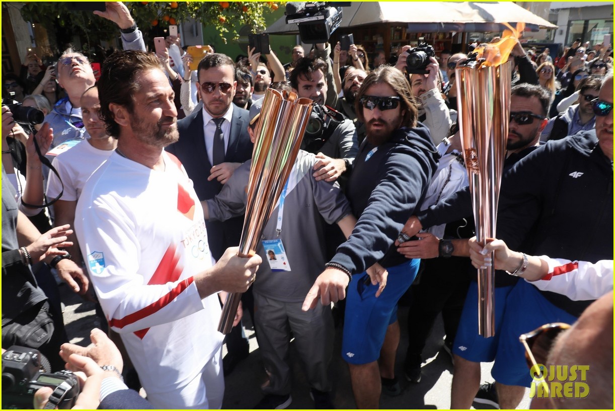 gerard butler olympic torch relay 254449050