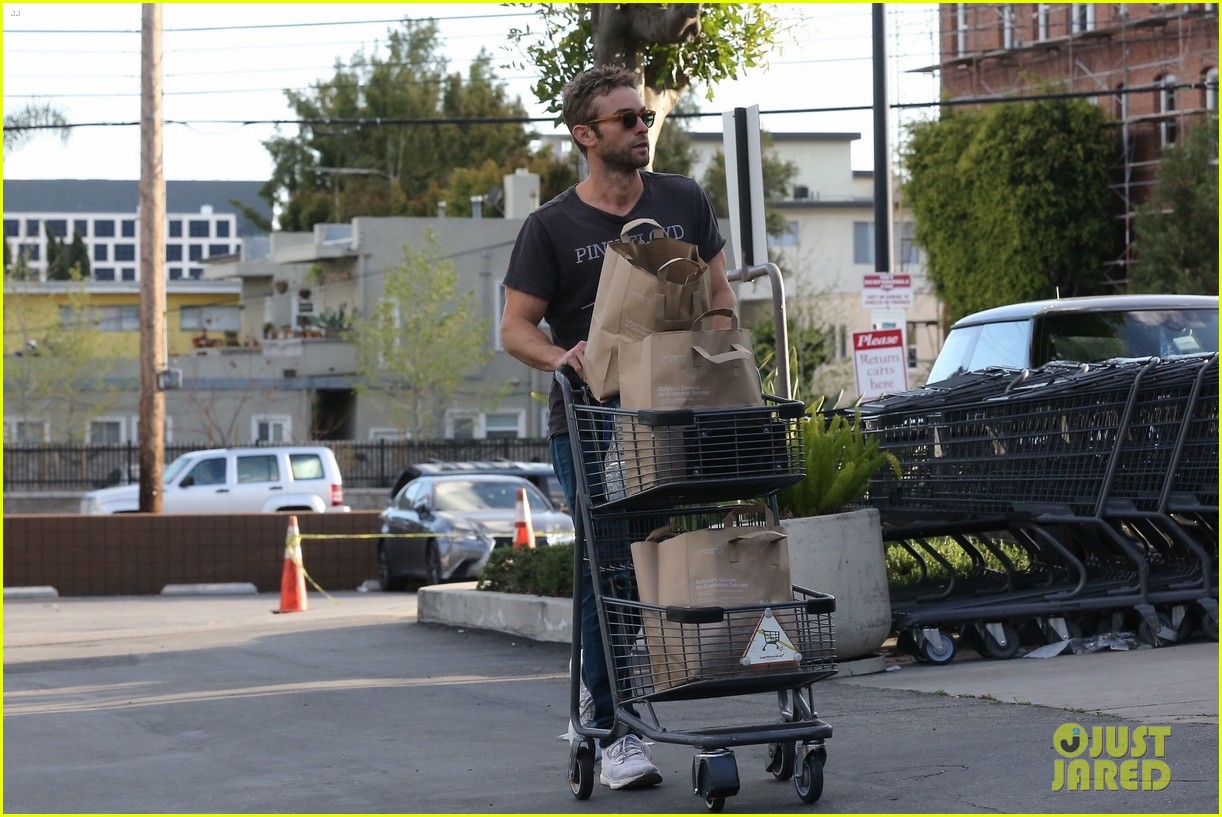 chace crawford protects himself with latex gloves at grocery store 194451299