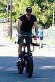 chace crawford puts muscles on display during a bike ride 02