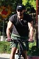 chace crawford puts muscles on display during a bike ride 03