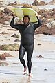jonah hill shows off tattoos stripping out of wetsuit 04