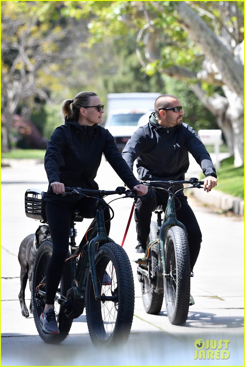 robin wright clement giraudet bike ride with dog 134451573
