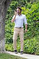 casey affleck takes call on his walk 05