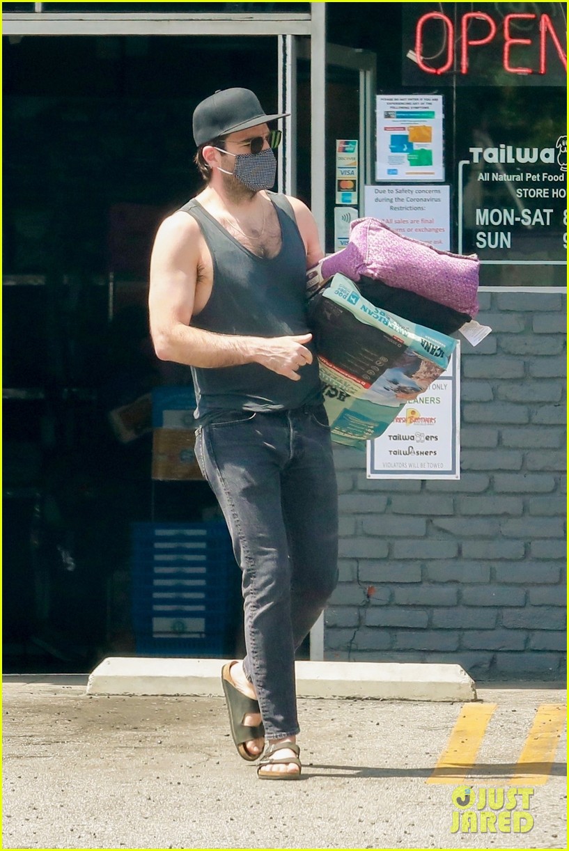 zachary quinto wears tank shirt while stocking up on toilet paper 014461488