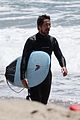christian bale spends the afternoon surfing in la 03