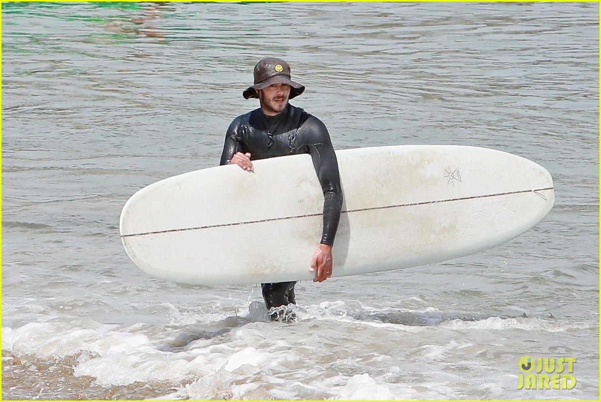 adam brody goes surfing in his wetsuit 414461611