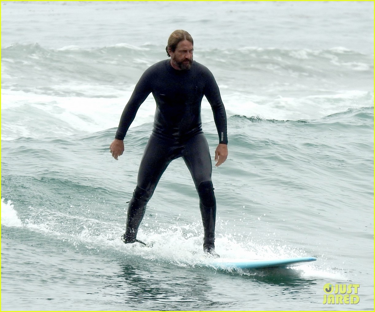 gerard butler surfing wetsuit 12