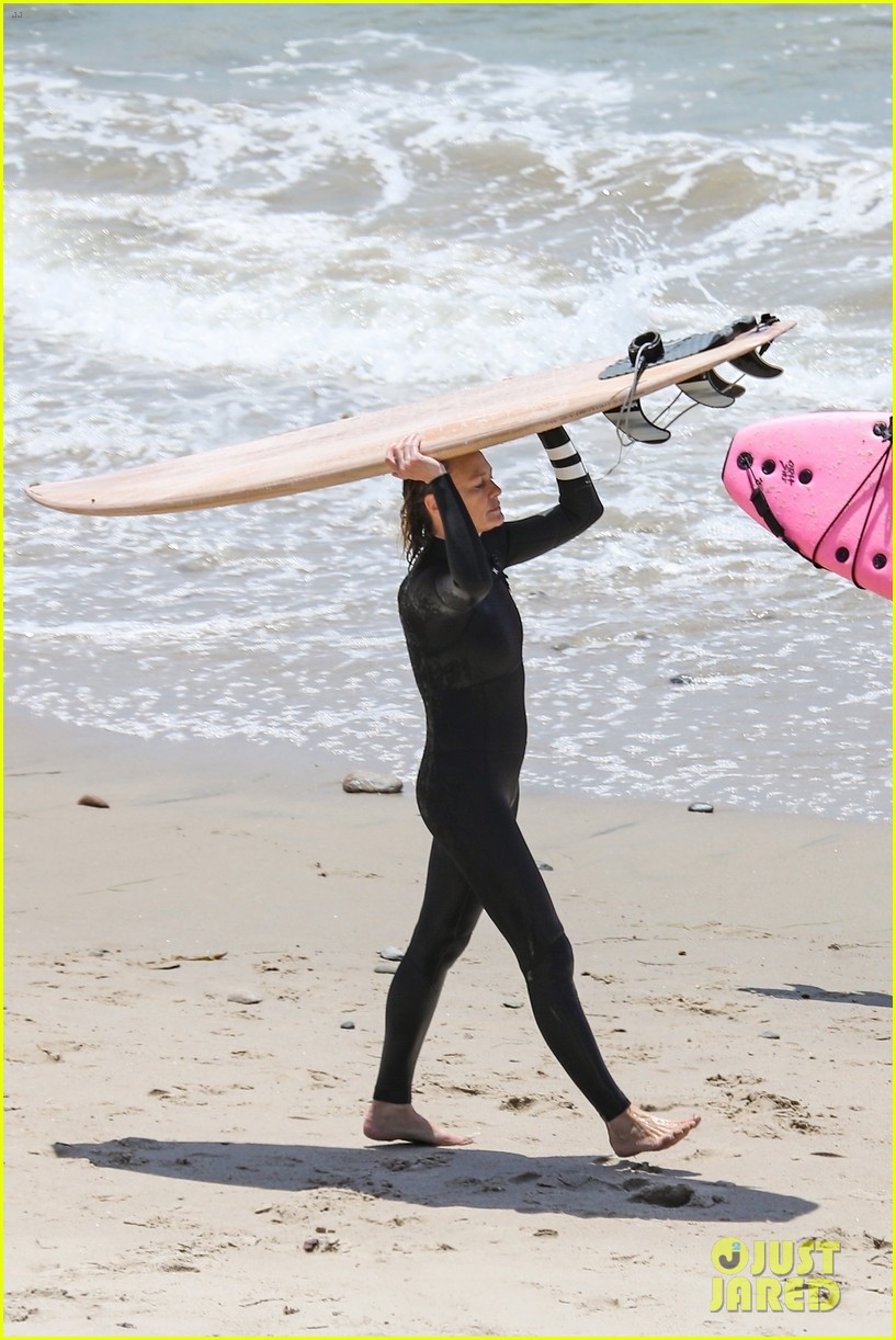 robin wright clement giraudet kisses while surfing 044463001