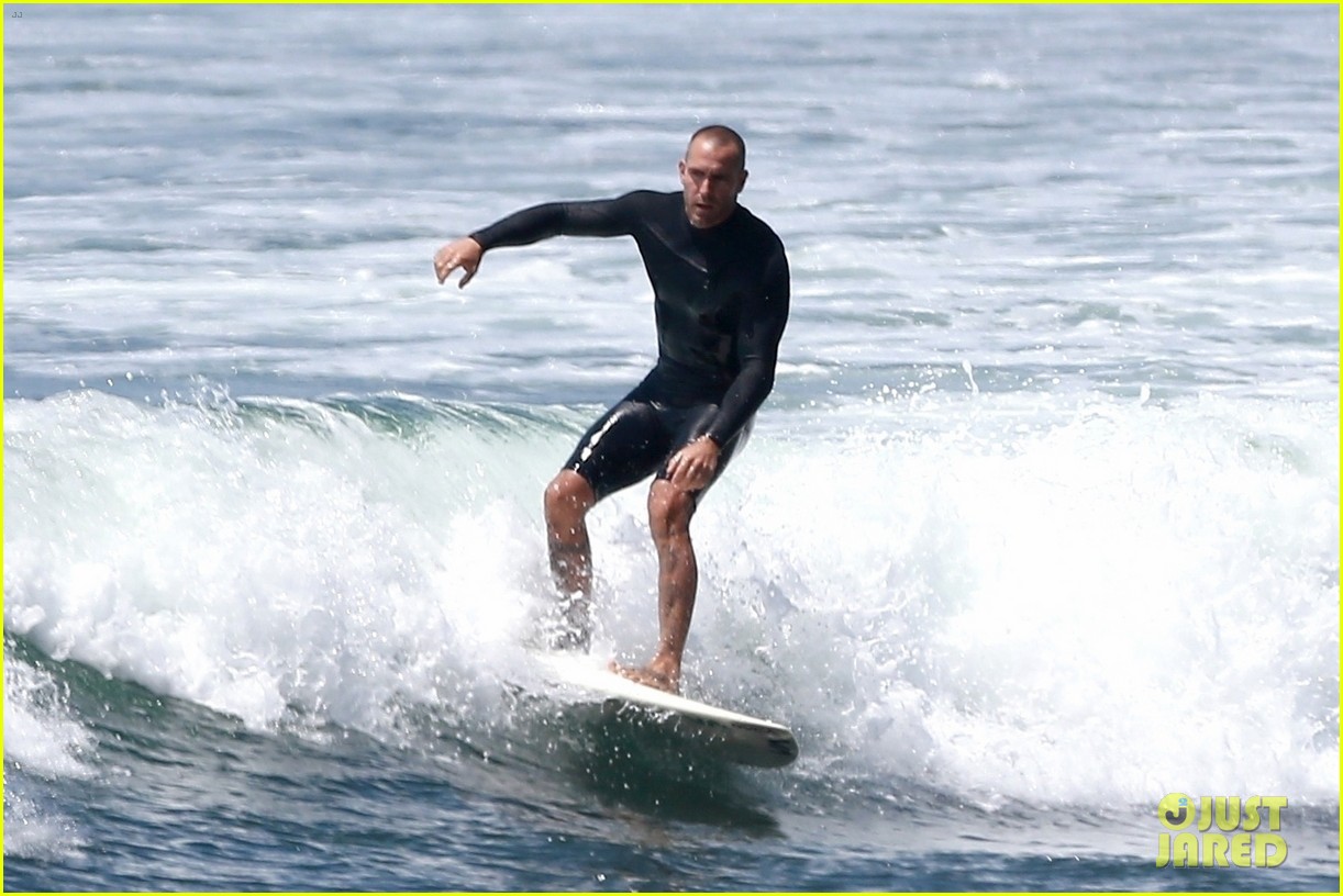 robin wright clement giraudet kisses while surfing 054463002