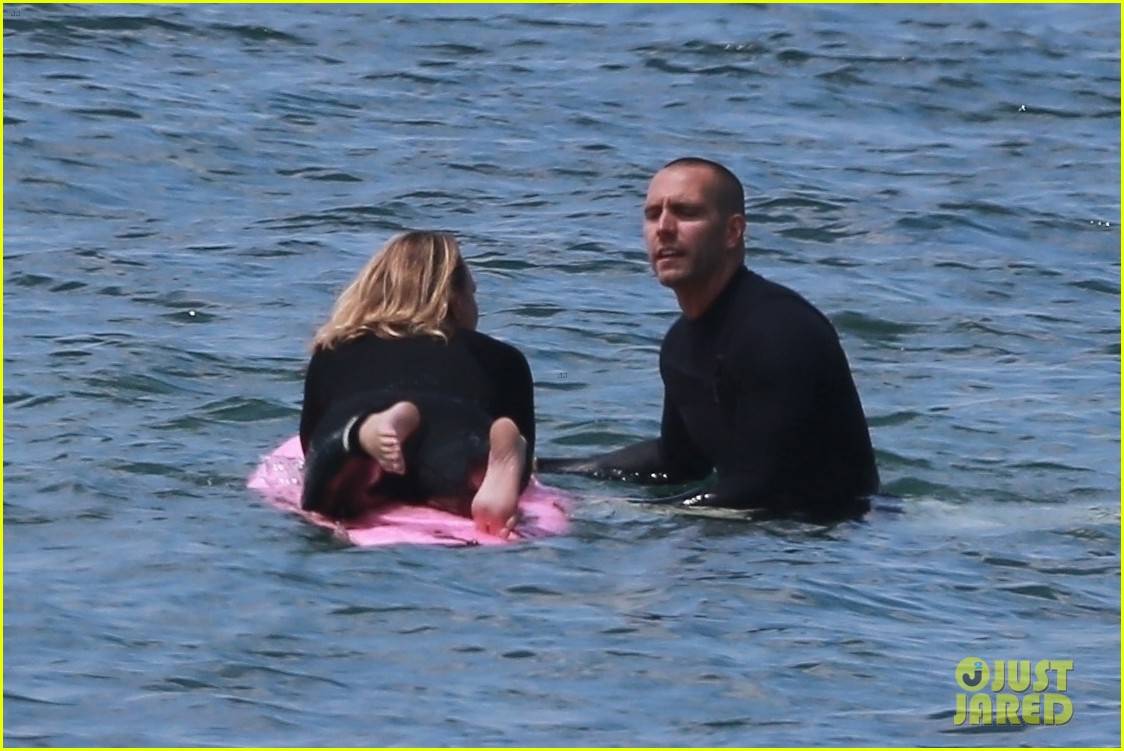 robin wright clement giraudet kisses while surfing 094463006