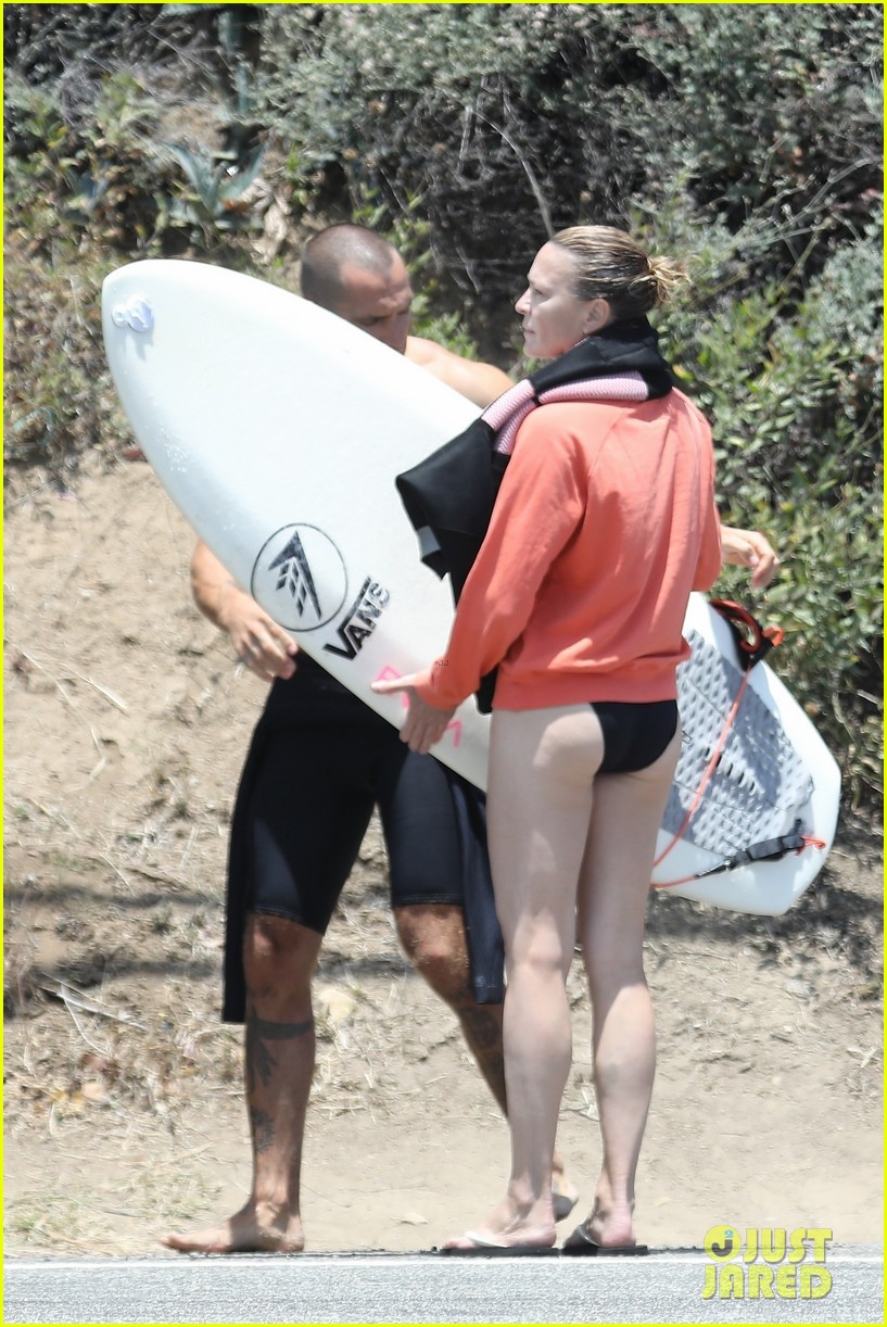 robin wright clement giraudet kisses while surfing 10