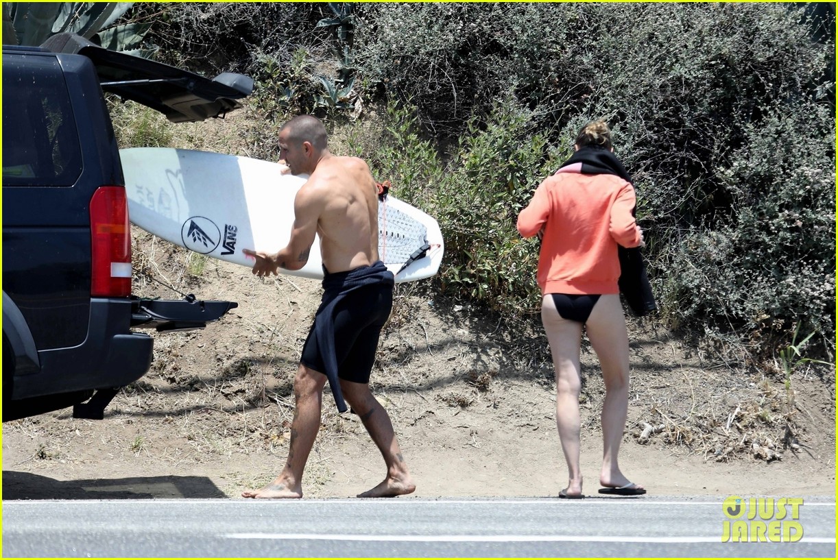 robin wright clement giraudet kisses while surfing 254463022