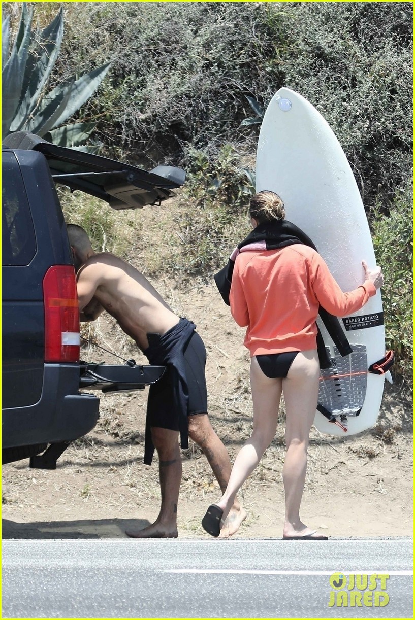 robin wright clement giraudet kisses while surfing 354463032