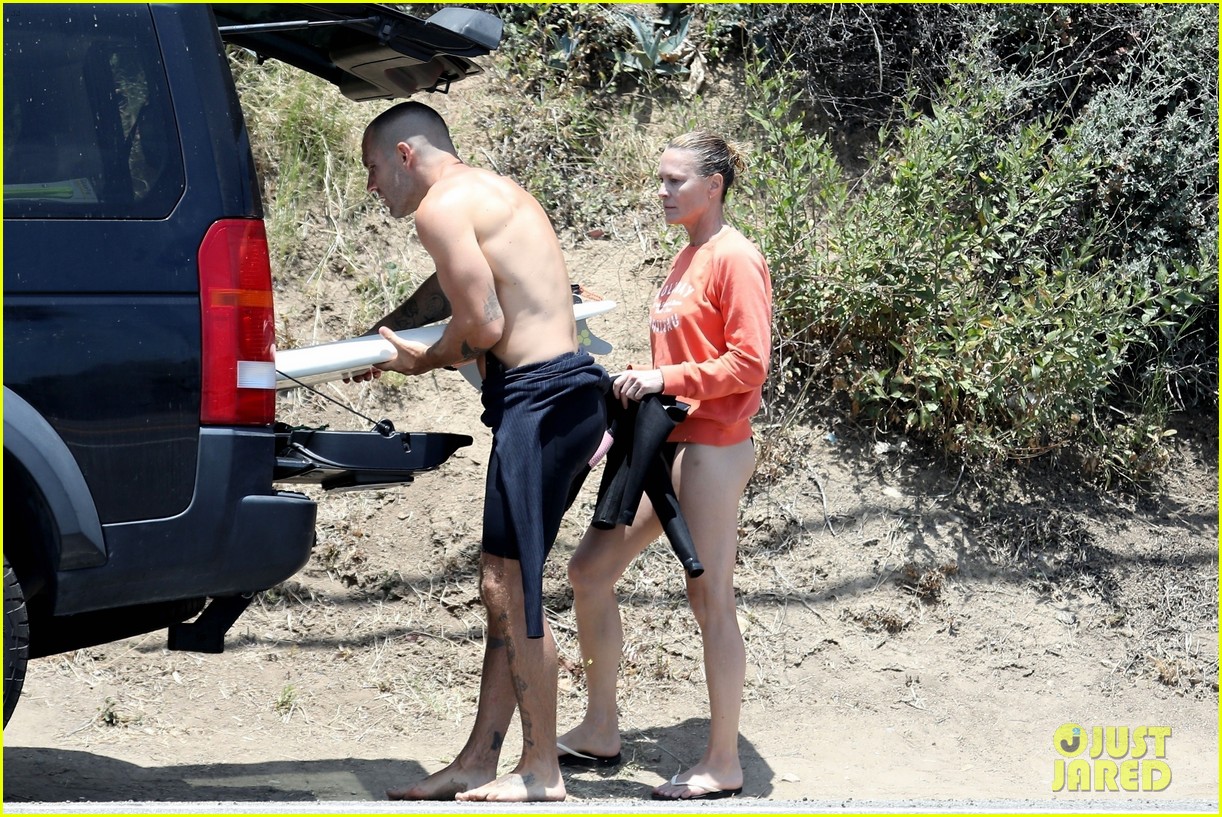 robin wright clement giraudet kisses while surfing 374463034