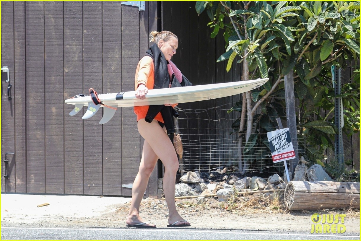 robin wright clement giraudet kisses while surfing 384463035