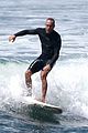 robin wright clement giraudet kisses while surfing 05