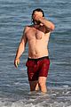joel edgerton shirtless at the beach 03