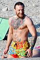 conor mcgregor shirtless at the beach 01