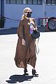 emma roberts covers up baby bump ytrip to bakery 05