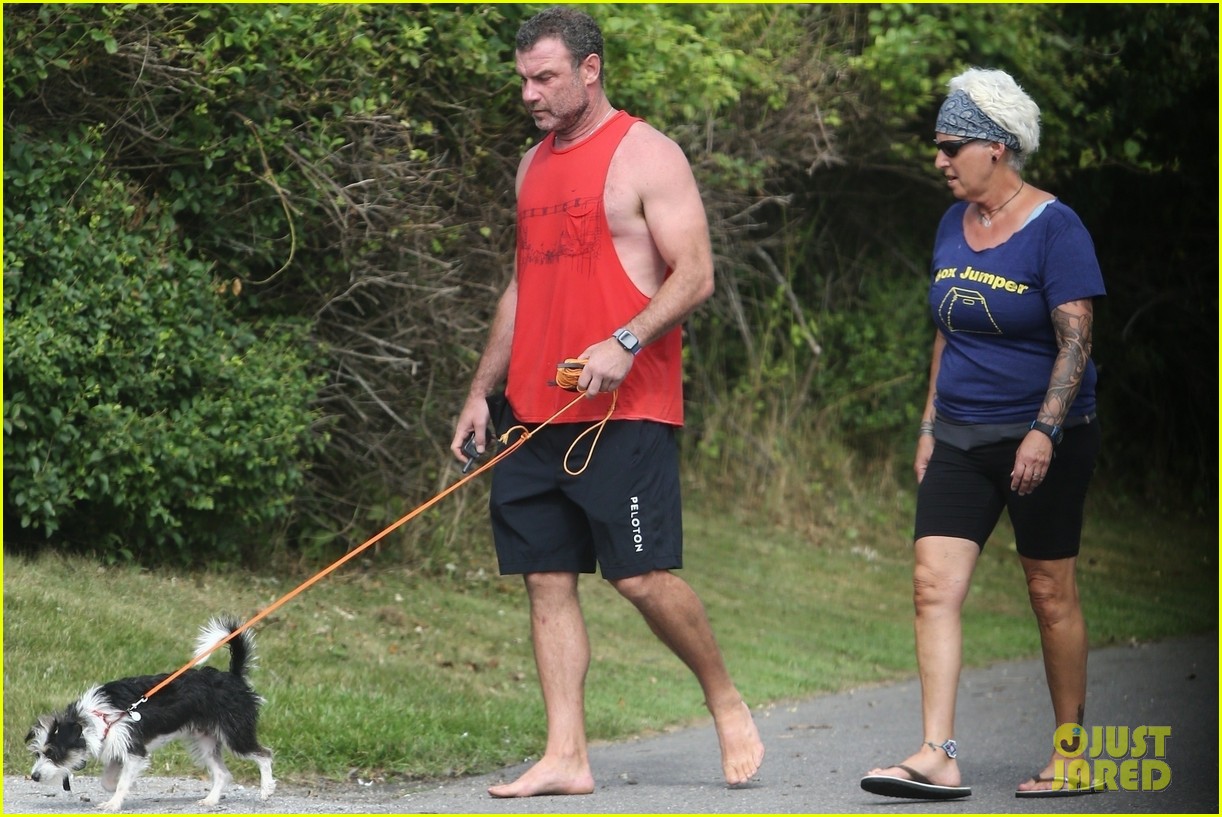 liev schreiber shows off his muscles at the beach 324474742