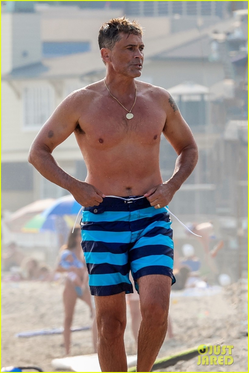 rob lowe shows of fit shirtless figure beach 19