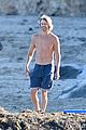 eric christian olsen goes for shirtless run on the beach 01