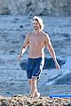 eric christian olsen goes for shirtless run on the beach 03