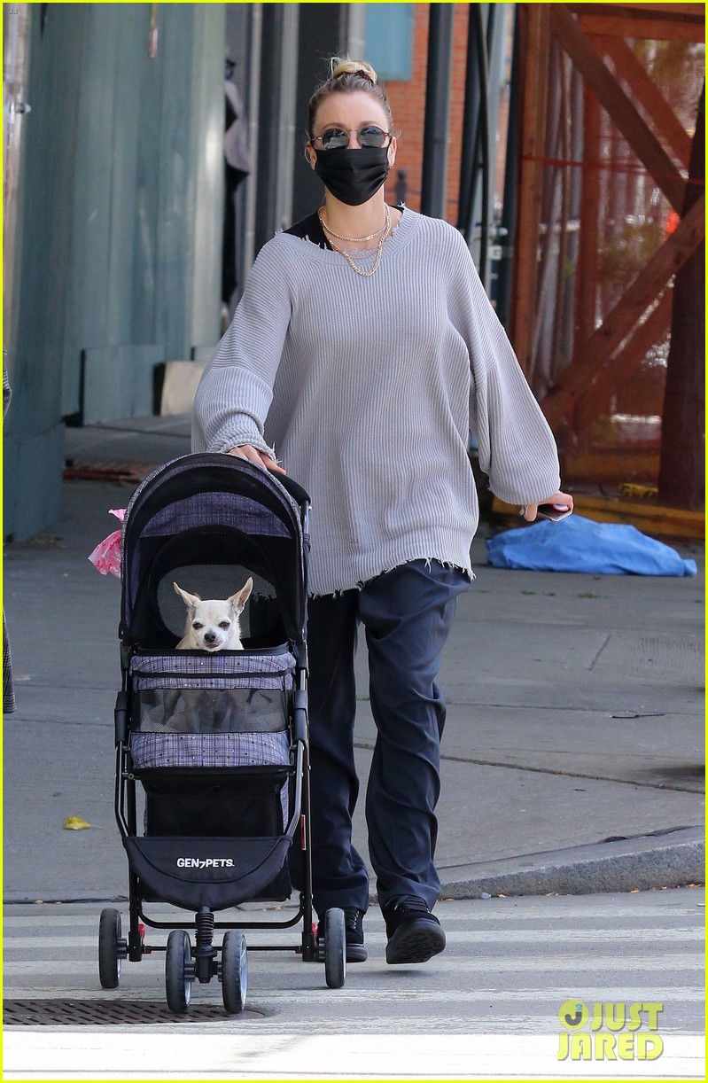 kaley cuoco takes dog for walk in a stroller 05