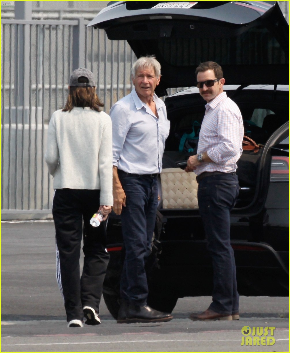 harrison ford at airport with calista flockhart 154481245