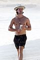 patrick schwarzenegger goes shirtless at beach 02