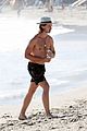 patrick schwarzenegger goes shirtless at beach 04