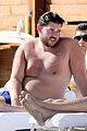 patrick schwarzenegger goes shirtless at beach 06