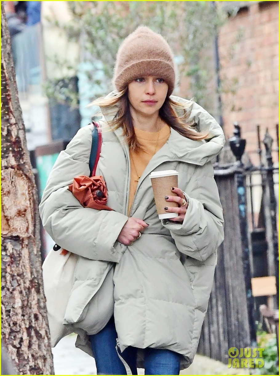 emilia clarke bundles up during a chilly fall day 174495635