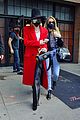 miley cyrus tophat red coat leaving hotel mom nyc 02