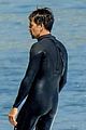 kyle howard in a wetsuit surfing 04